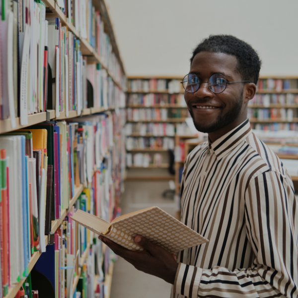 An image of an African in a library - Vickies Foundation